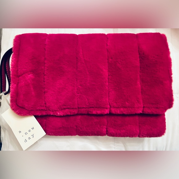 a new day Handbags - NWT Target A New Day Berry Faux Fur Clutch Wristlet